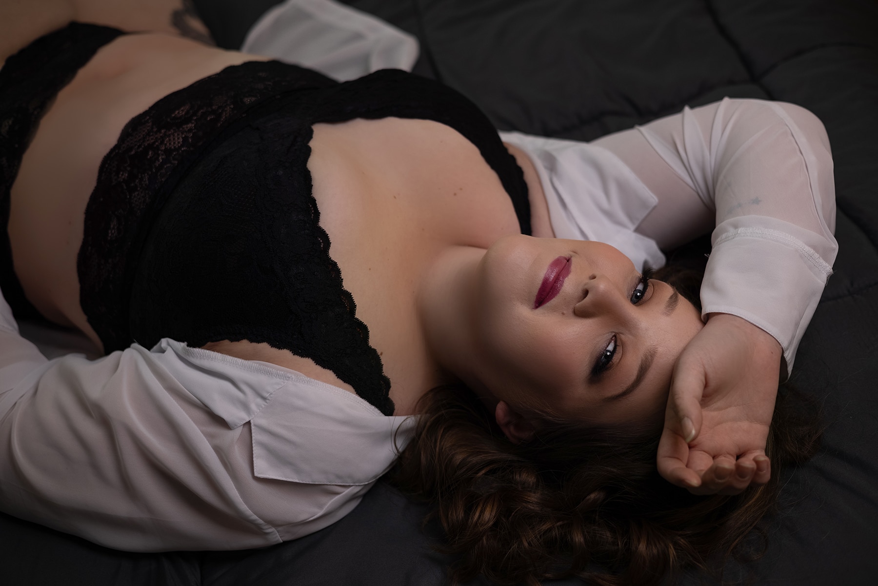 Woman wearing a bralette and panty set for her luxury plus-size boudoir session near New Cumberland PA with Shannon Hemauer Photography.