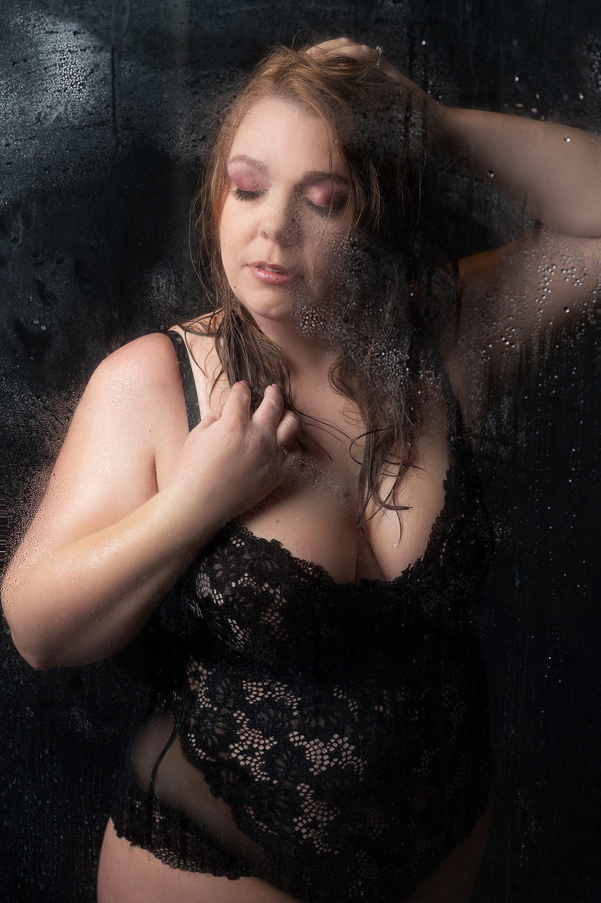 Woman wearing lace teddy for boudoir shower session with Shannon Hemauer Photography located near Hershey PA.