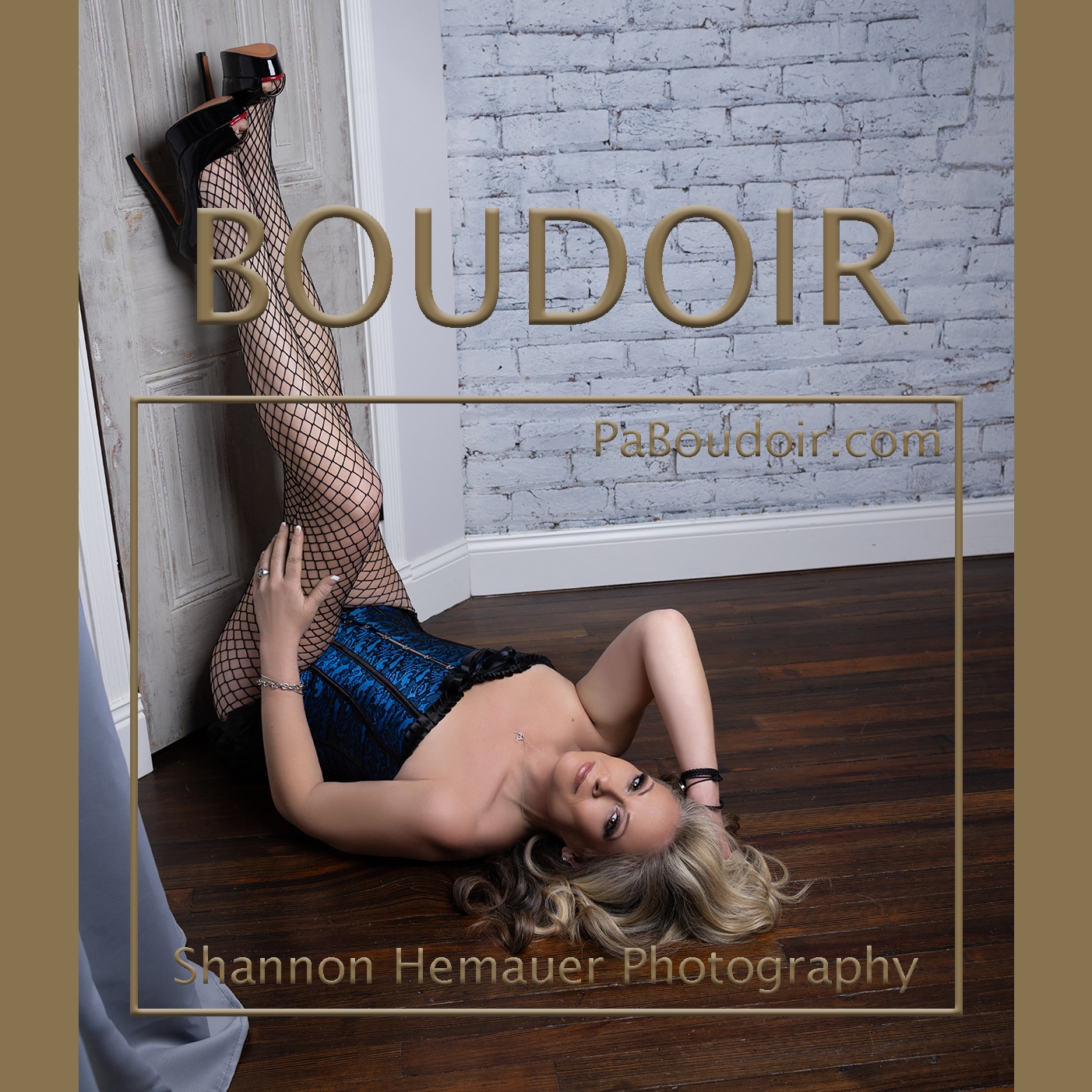 Woman wears a blue corset for her boudoir session with Shannon Hemauer, located near Lancaster, PA.