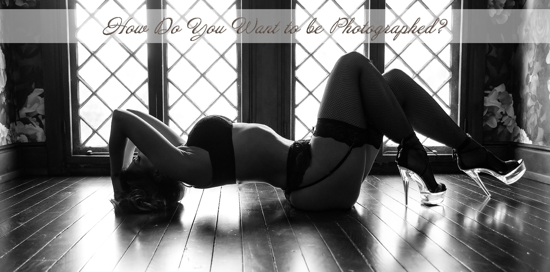 Woman poses on a hardwood floor for her boudoir session with photographer Shannon Hemauer, located in Mechanicsburg, PA.